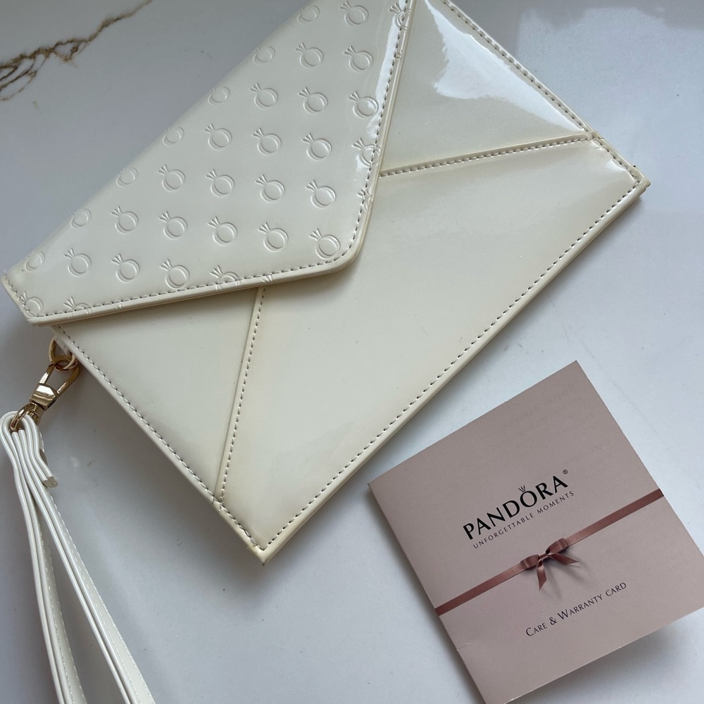 Pandora Cream Clutch with Embossed Patterns